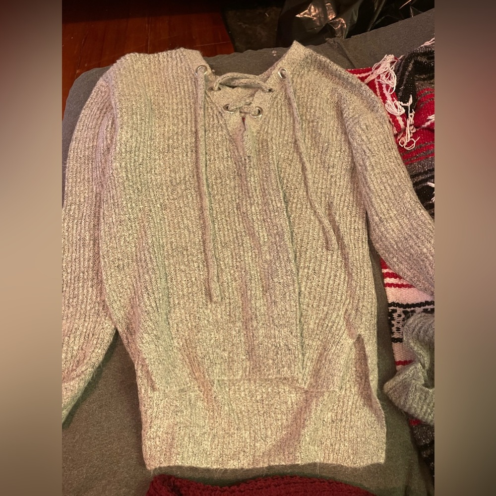 never worn sweater with cross up front